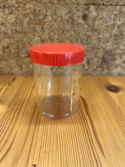 Gennemsigtig plastikbøtte med rødt låg – robust opbevaring til småting